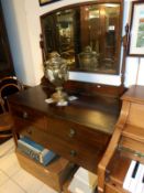 A mahogany inlaid dressing table