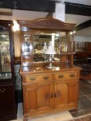 A good quality oak mirror backed sideboard