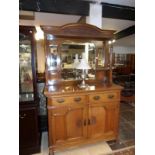 A good quality oak mirror backed sideboard