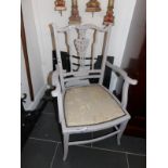 A painted elbow chair