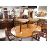 A teak dining table & 4 chairs
