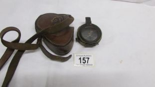 A leather cases 1918 military compass by E Koehn, Geneve,