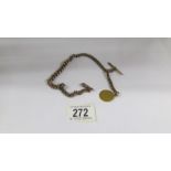 A 9ct gold Albert watch chain with George III 1792 guinea coin fashioned as a fob