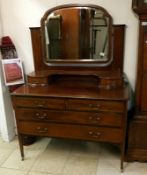 A mahogany inlaid dressing table