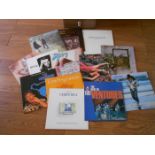 A box of approximately 60 rock and pop LP records including Led Zeppelin, Simon and Garfunkle,