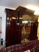 A Victorian mahogany wardrobe with central mirror door