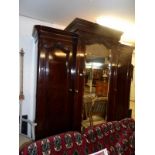 A Victorian mahogany wardrobe with central mirror door