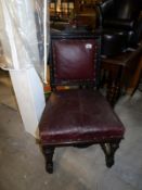 A 19th century chair with leather seat and back