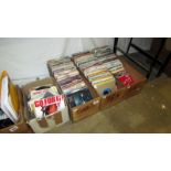 4 boxes of 45 rpm records