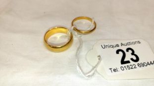 An 18ct gold band ring (approx. 8gms) and a 22ct gold band ring (approx.