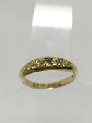 An old cut 5 stone diamond ring dated London 1902, tests as 18ct gold,