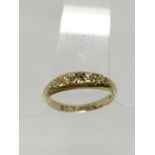 An old cut 5 stone diamond ring dated London 1902, tests as 18ct gold,