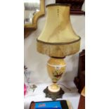 A Victorian hand painted table lamp with metal base & silk shade