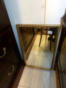 A gilt framed bevel edged mirror