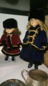 2 porcelain collector's doll in winter dress