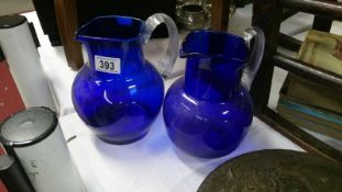 2 Bristol blue glass jugs with reeded handles