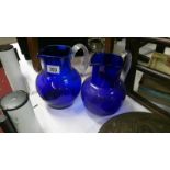 2 Bristol blue glass jugs with reeded handles