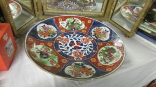 A mid 20th century large Imari charger