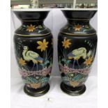 A large pair of continental 19th century vases decorated with herons, 40 cm tall,
