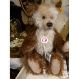 A boxed Steiff blue bear with collar, 32cm,