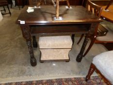 An oak side table (missing drawer)
