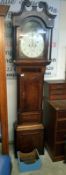 An oak cased 8 day Grandfather clock with painted dial by T Gadsby,