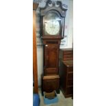 An oak cased 8 day Grandfather clock with painted dial by T Gadsby,