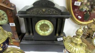 An Edwardian Paladian style black slate mantel clock