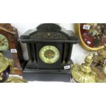 An Edwardian Paladian style black slate mantel clock