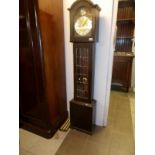 A modern oak long case clock