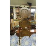 An oak 3 tier folding cake stand