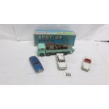 3 unboxed Triang Spot-on models and a boxed ERF flat float with barrel load