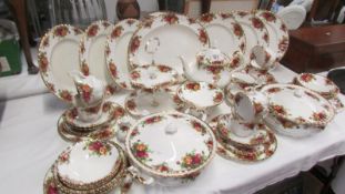 In excess of 50 pieces of Royal Albert Old Country Roses tea and dinner ware