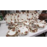 In excess of 50 pieces of Royal Albert Old Country Roses tea and dinner ware