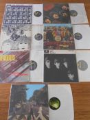 A collection of original release Beatles LP Yellow Parlophone records
