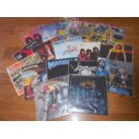 A box of approximately 60 thrash and heavy metal rock LP records including Iron Maiden, Halloween,