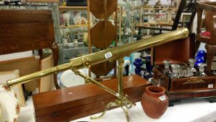 A Victorian brass telescope in mahogany case (no maker's marks)
