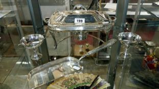 A silver plated tureen on stand,