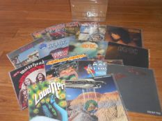 A box of approximately 60 thrash and heavy metal rock LP records including Iron Maiden, Metallica,