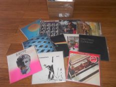A box of approximately 60 progressive and classic rock LP records including Jimi Hendrix, Beatles,