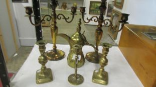 A mixed lot of brassware comprising 2 pairs of candlesticks,