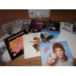 A box of approximately 90 progressive rock LP records including Led Zeppelin, Budgie, Jimi Hendrix,