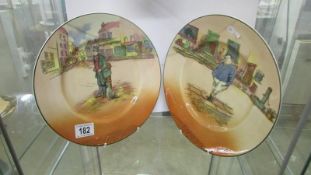 A pair of large Dicken's plates