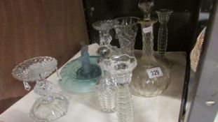 A mixed lot of glass ware including candlesticks