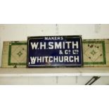 An enamel W H Smith sign & an enamel washstand back