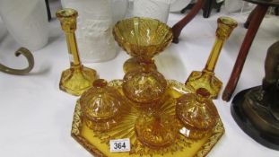 An amber glass trinket set
