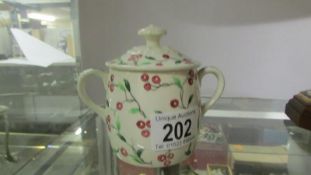 A lovely old small lidded pot with cherry pattern (mark unknown)