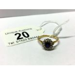 A gold ring set sapphire and diamonds, marked 18ct,