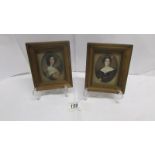 A pair of framed and glazed miniature portraits of ladies