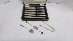 A cased set of silver handled butter knives,